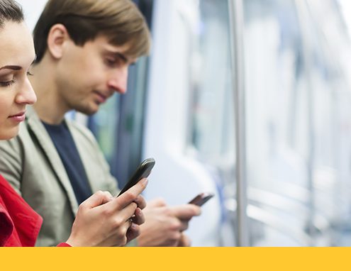 Young adults browsing social media on smart phones