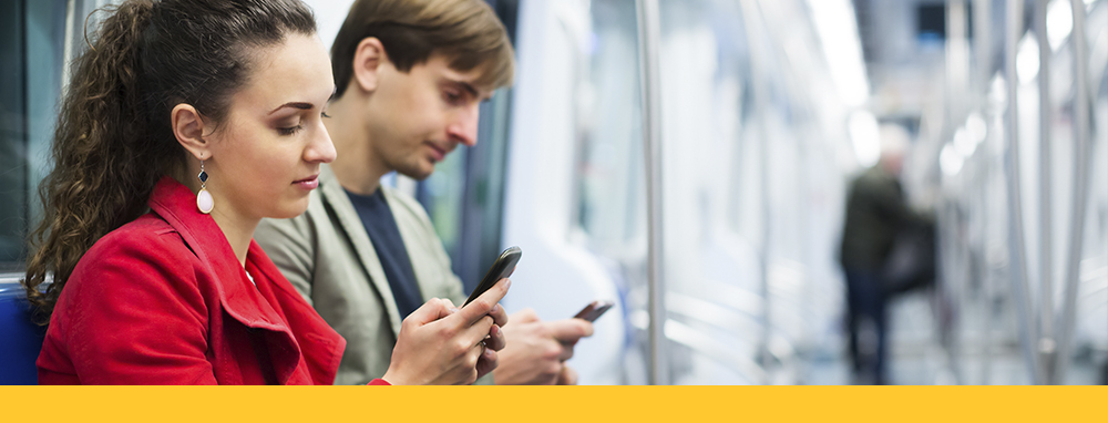 Young adults browsing social media on smart phones